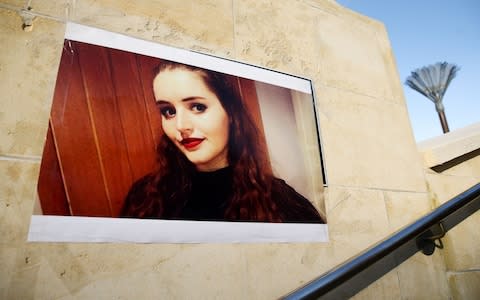 A photo of British backpacker Grace Millane overlooks a vigil held at Civic Square in Wellington earlier this week - Credit: Hagen Hopkins/Getty Images