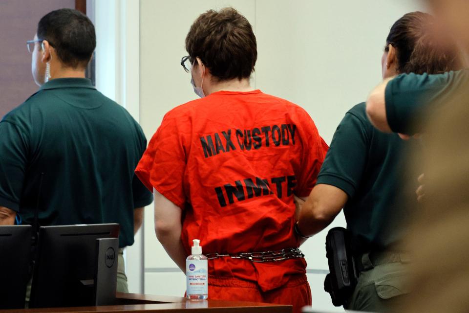 FILE - Marjory Stoneman Douglas High School shooter Nikolas Cruz is escorted from the courtroom following a hearing regarding possible jury misconduct during deliberations in the penalty phase of his trial on Friday, Oct. 14, 2022, at the Broward County Courthouse in Fort Lauderdale, Fla. Cruz will be sentenced to life in prison this week â€” but not before the families of the 17 people he murdered get the chance to tell him what they think. A two-day hearing is scheduled to begin Tuesday, Nov. 1, that will conclude with Circuit Judge Elizabeth Scherer formally sentencing Cruz for his Feb. 14, 2018, massacre at the Florida high school. (Amy Beth Bennett/South Florida Sun Sentinel via AP, Pool, File)