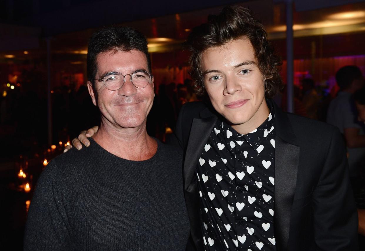 LONDON, ENGLAND - AUGUST 20: (EXCLUSIVE COVERAGE) Simon Cowell and Harry Styles attend the "One Direction This Is Us" world premiere after party on August 20, 2013 in London, England. (Photo by Ian Gavan/Getty Images for Sony Pictures)