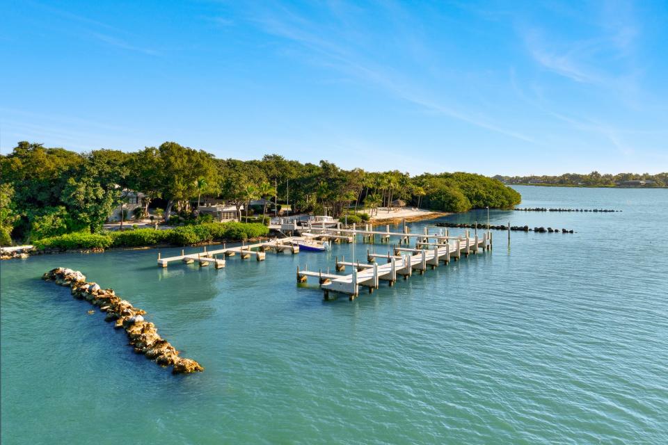 The marina with 23 slips and space for a mega-yacht on Pumpkin Key. The entire private island along with a mainland house in the Key Largo Ocean Reef Club was listed at $75 million on Feb. 13, 2024 by Compass.