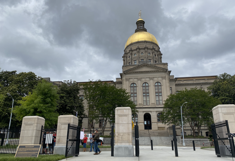 A small pro-reopening demonstration in front of Georgia's Capitol. (Yahoo) 