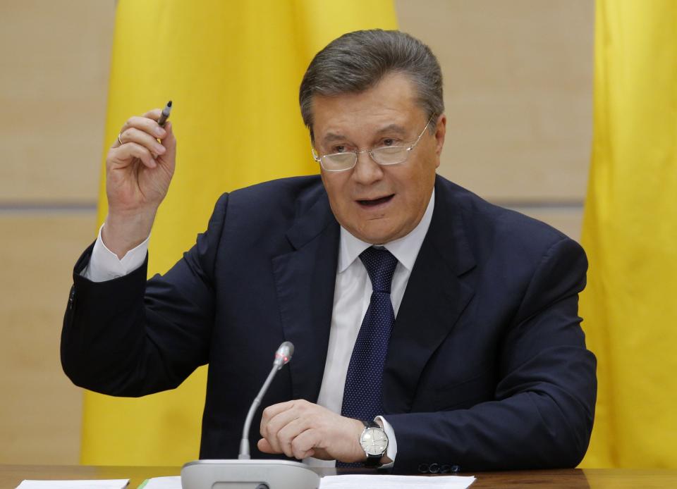 Ousted Ukrainian President Viktor Yanukovich takes part in a news conference in the southern Russian city of Rostov-on-Don February 28, 2014. Yanukovich, appearing in public for the first time since he was ousted as Ukraine's president, said in Russia on Friday he would not give up the fight for his country's future. REUTERS/Maxim Shemetov (RUSSIA - Tags: POLITICS)