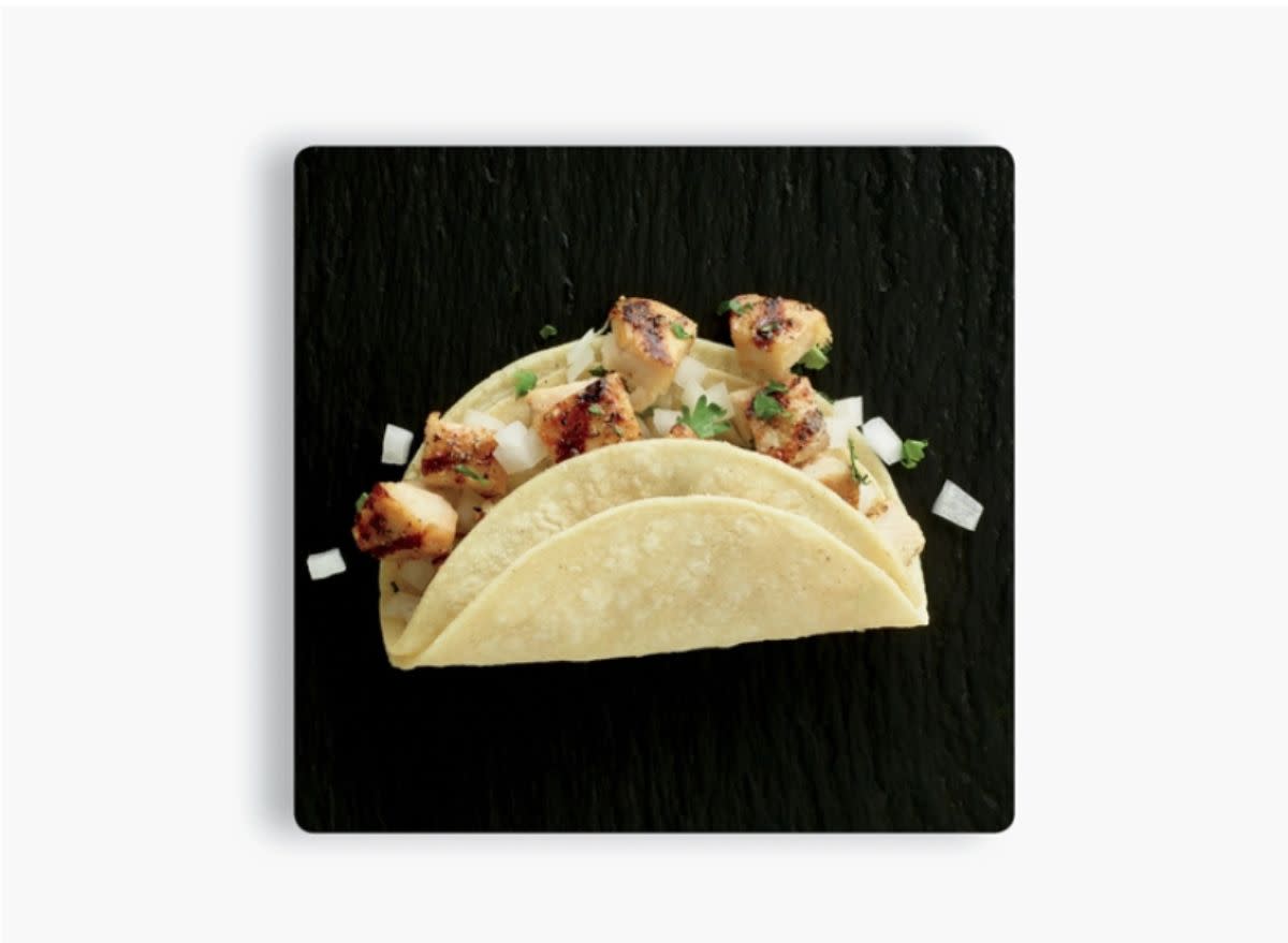 taco on a black plate