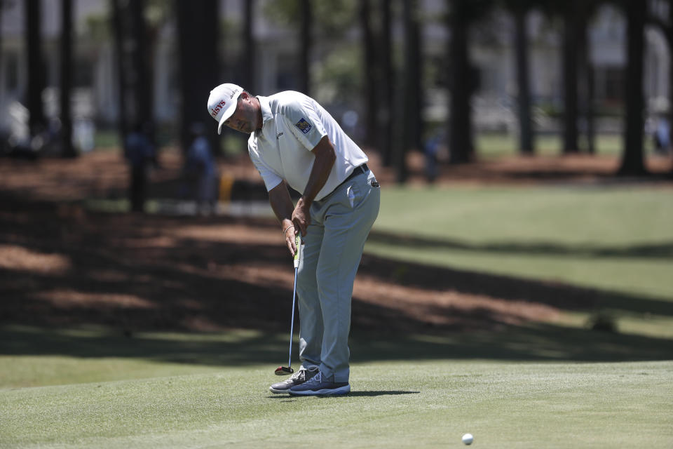 Ryan Palmer putts on the first tee during the third round of the RBC Heritage golf tournament, Saturday, June 20, 2020, in Hilton Head Island, S.C. (AP Photo/Gerry Broome)