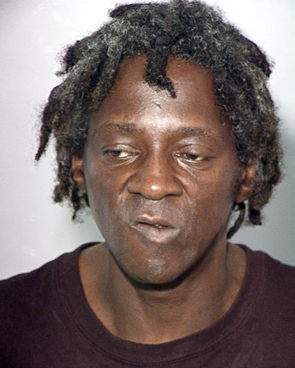 This image released by the Las Vegas Police Department shows rapper Flavor Flav, also known as William Jonathan Drayton, Jr., in a police booking photo taken Wednesday, Oct. 17, 2012. Las Vegas police say that Flavor Flav was jailed early Wednesday on felony charges stemming from a domestic argument with his fiancee and threats to attack her teenage son with a knife. Officer Bill Cassell said no one was injured before Drayton was arrested about 3:30 a.m. Wednesday, at a home in a neighborhood several miles southwest of the Las Vegas Strip. (AP Photo/Las Vegas Police Department)