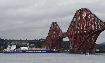 The tanker carrying the first shipment of U.S. shale gas reverses under the Forth Bridge as it travels to dock at Grangemouth in Scotland, Britain September 27, 2016. REUTERS/Russell Cheyne