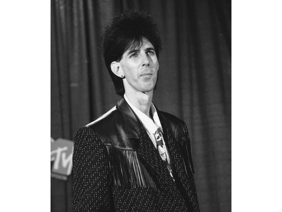 Musician Ric Ocasek, of the group The Cars, appears at the MTV Video Music Awards in New York on Sept. 14, 1984. The Cars frontman whose deadpan vocal delivery and lanky, sunglassed look defined a rock era, died on Sept. 15 at age 75. (AP Photo)
