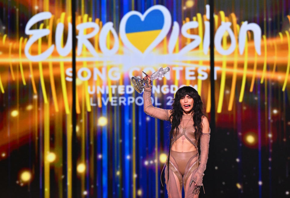Loreen from Sweden cheers with the Eurovision trophy