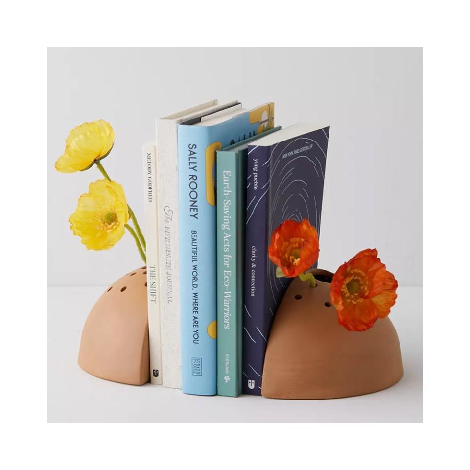 <p><a href="https://go.redirectingat.com?id=74968X1596630&url=https%3A%2F%2Fwww.urbanoutfitters.com%2Fshop%2Fkora-bud-vase-bookend-set&sref=https%3A%2F%2Fwww.elle.com%2Ffashion%2Fshopping%2Fg44714505%2Fbest-gifts-for-book-lovers%2F" rel="nofollow noopener" target="_blank" data-ylk="slk:Shop Now;elm:context_link;itc:0;sec:content-canvas" class="link ">Shop Now</a></p><p>Kora Bud Vase Bookend Set</p><p>urbanoutfitters.com</p><p>$24.99</p>