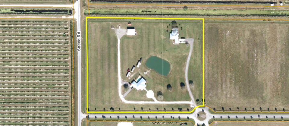 Property in the 20000 block of Southern Star Drive in St. Lucie County where a Piper plane carrying two people crashed into a large storage building on Aug. 17, 2023. One person died, and the other was taken by helicopter to a hospital.