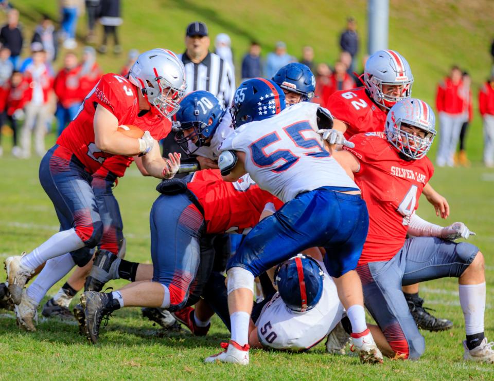 Ryan Carroll (4) played tight end and defensive end for Silver Lake.