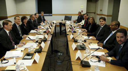 Assistant U.S. Secretary of State for Western Hemisphere Affairs Roberta Jacobson (3rd L) and Josefina Vidal (4th R), director general of the U.S. division of the Cuban foreign ministry, sit with their delegations at the fourth round of closed talks to re-establish diplomatic relations between the. REUTERS/Kevin Lamarque