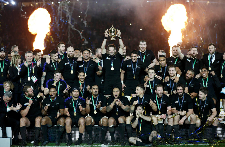 The New Zealand All Blacks celebrate with the Webb Ellis trophy after winning the Rugby World Cup final against Australia in 2015. (FILE PHOTO: Reuters/Stefan Wermuth)