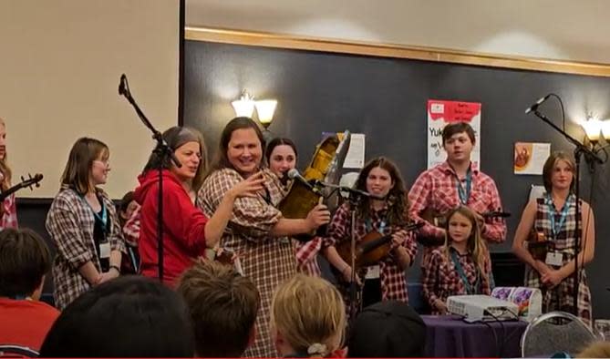 Ingrid Johnston and the Cariboo Chilcotin Youth Fiddle Society of Williams Lake, BC, will present gifts to Yukon fiddle teacher Keitha Clark at the Canadian Grand Masters Fiddling Competition in August 2024, including a vintage violin case once owned by legendary Yukon fiddler Joe Loutchan.