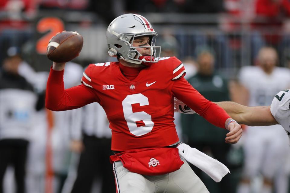 Ohio State quarterback Kyle McCord plays against Michigan State.