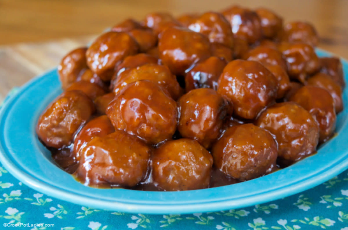 <p>Crock Pot Ladies</p><p>Barbecue sauce and apricot jam give these meatballs a sweet and smoky flavor.</p><p><strong>Get the recipe: <a href="https://crockpotladies.com/crockpot-express-bbq-meatballs/" rel="nofollow noopener" target="_blank" data-ylk="slk:Crock Pot BBQ Express Meatballs;elm:context_link;itc:0;sec:content-canvas" class="link rapid-noclick-resp">Crock Pot BBQ Express Meatballs</a></strong></p>