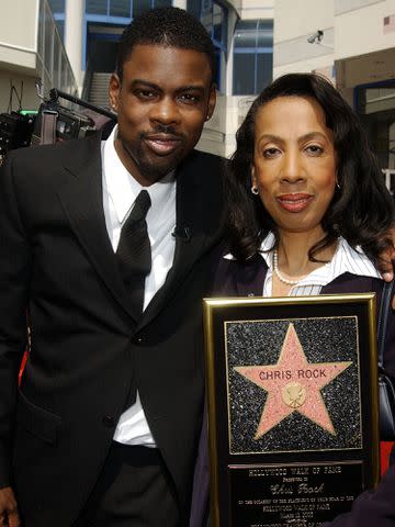 <p>Vince Bucci/Getty</p> Chris Rock and mom attend ceremony honoring him with a star on the Hollywood Walk of Fame in 2003