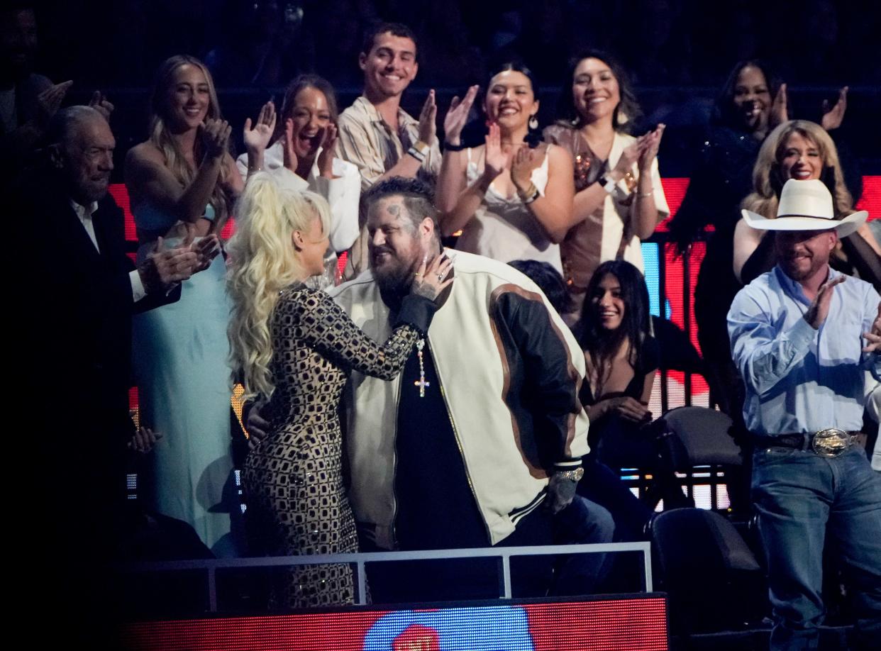 Jelly Roll hugs his wife, Bunnie XO, after winning the CMT Performance of the Year award at the 2024 CMT Music Awards at the Moody Center in Austin, Tex., Sunday night, April 7, 2024.