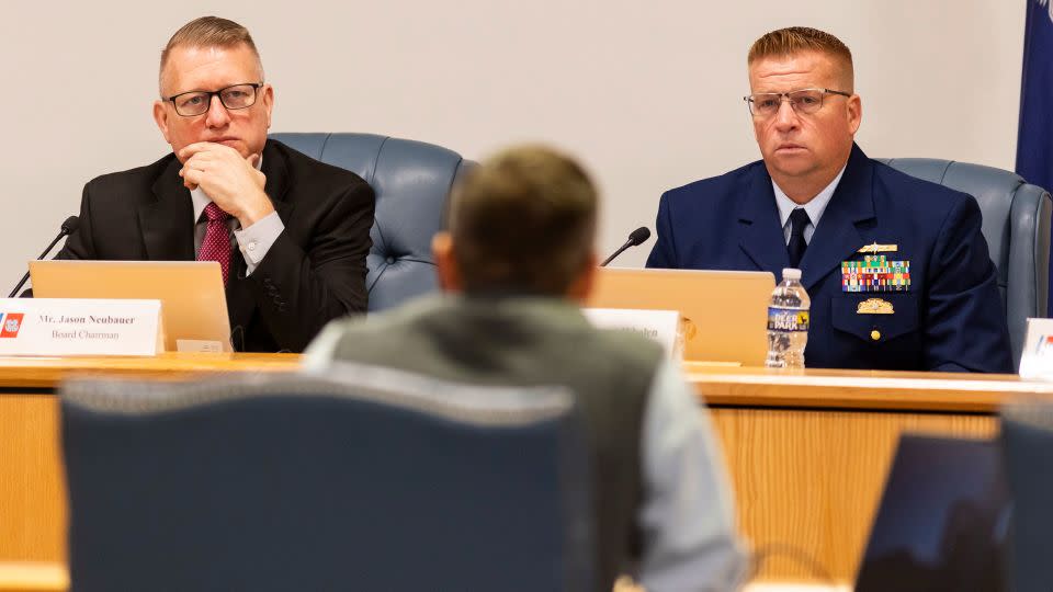 Tony Nissan, head engineer for OceanGate, testifies before Coast Guard's Jason Neubauer, left, and Thomas Whalen, right, during the Titan marine board formal hearing in North Charleston, South Carolina. - Mic Smith/AP