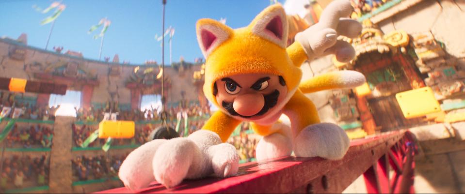 Mario leaning menacingly on the bridge in the Kong Island Arena wearing a Lucky Cat Suit power-up