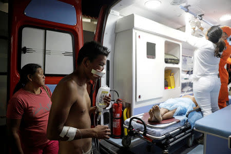 FILE PHOTO: An ambulance carrying indigenous people wounded during clashes in Venezuela are seen at a hospital, at the border between Venezuela and Brazil, in Pacaraima, Roraima state, Brazil, February 22, 2019. REUTERS/Ricardo Moraes/File Photo