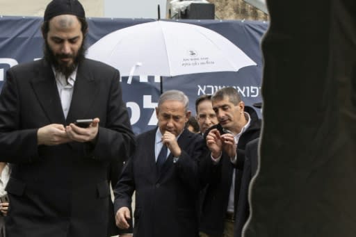 Netanyahu visits a medical centre during a campaign overshadowed by the COVID-19 virus outbreak