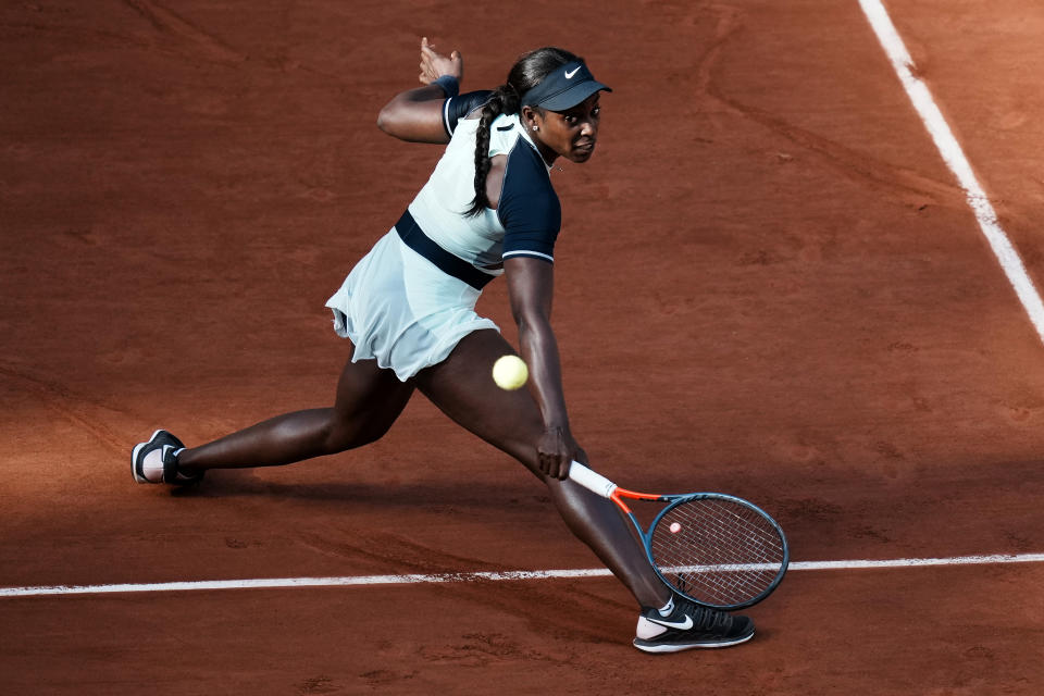 Sloane Stephens of the U.S. returns the ball to France's Diane Parry during their third round match of the French Open tennis tournament at the Roland Garros stadium Friday, May 27, 2022 in Paris. (AP Photo/Thibault Camus)