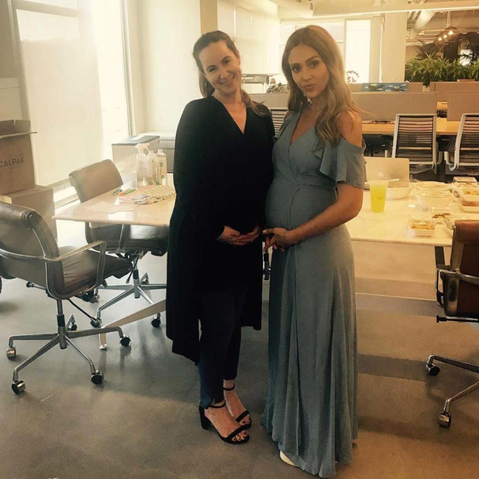 <p>The actress showed off her bump alongside the Honest Company's PR director Jen Kroog Rosenberg in a glam pale blue off-the-shoulder maxidress. </p>