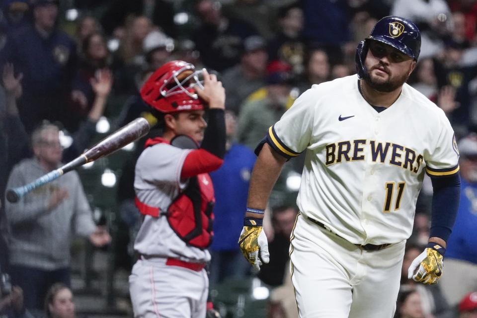 Milwaukee Brewers' Rowdy Tellez hits a two-run home run during the sixth inning of a baseball game against the Cincinnati Reds Wednesday, May 4, 2022, in Milwaukee. (AP Photo/Morry Gash)