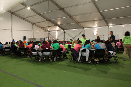 Children are seen at a tent city set up to hold immigrant children separated from their parents or who crossed the U.S. border on their own in Tornillo, Texas, U.S., in this U.S. Department of Health and Human Services (HHS) image released on October 12, 2018. Courtesy HHS/Handout via REUTERS