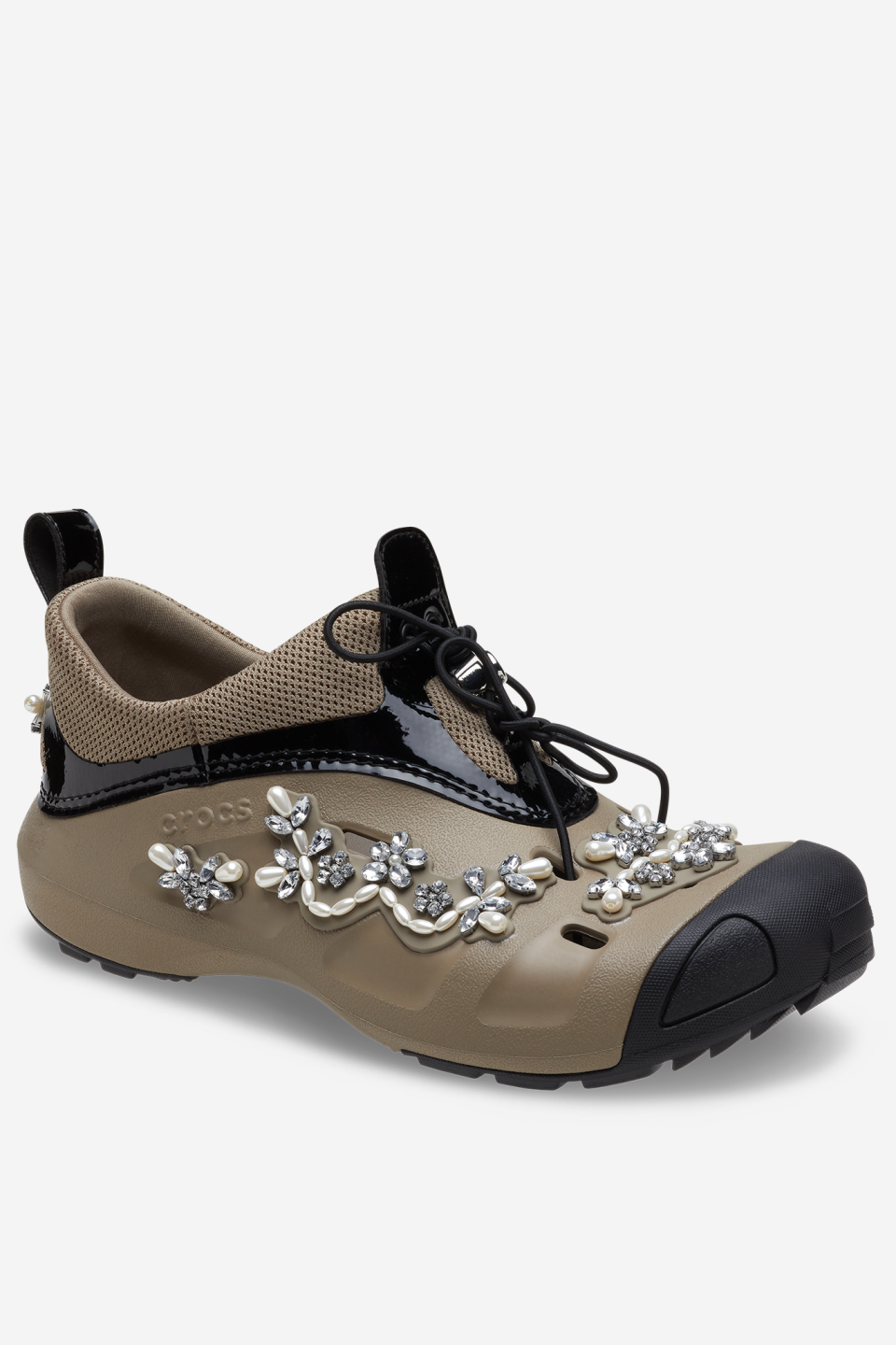 <p><a href="https://shop-us.simonerocha.com/collections/simone-rocha-x-crocs/products/crocs-quick-trail-khaki" rel="nofollow noopener" target="_blank" data-ylk="slk:Shop Now;elm:context_link;itc:0;sec:content-canvas" class="link ">Shop Now</a></p><p>Quick Trail</p><p>simonerocha.com</p><p>$200.00</p>