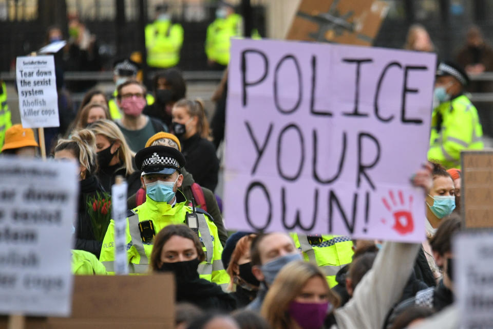 Demonstrators during a protest in Parliament Square, central London, in memory of Sarah Everard, who went missing while walking home from a friend's flat on 3 March.