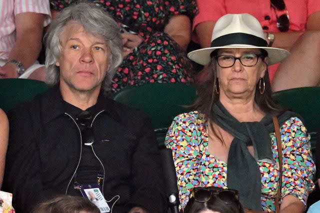 <p>GLYN KIRK/AFP via Getty </p> Jon Bon Jovi and Dorothea Hurley at Wimbledon