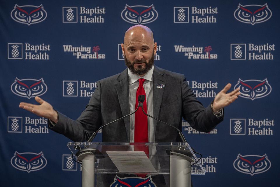 John Jakus speaks Friday during a Florida Atlantic University news conference where he was introduced as the new men's basketball coach at the Eleanor R. Baldwin Arena on campus in Boca Raton.