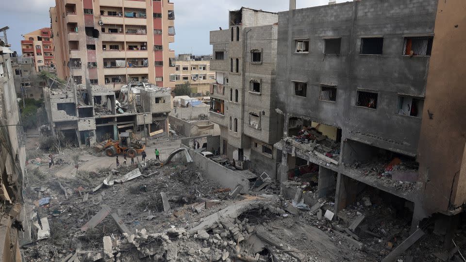 Palestinians inspect the damage a day after a deadly hostage rescue operation by Israeli forces in the Nuseirat refugee camp in central Gaza on June 9, 2024. - Eyad Baba/AFP/Getty Images