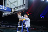 Iona coach Rick Pitino cuts the net after Iona's win in an NCAA college basketball game against Fairfield during the finals of the Metro Atlantic Athletic Conference tournament Saturday, March 13, 2021, in Atlantic City, N.J. (AP Photo/Matt Slocum)