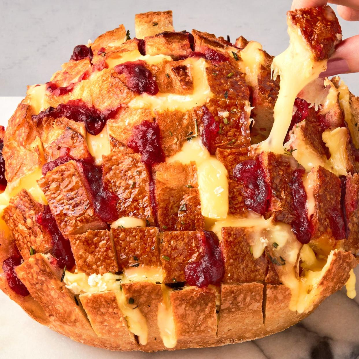 pull apart bread with cheese and cranberry sauce