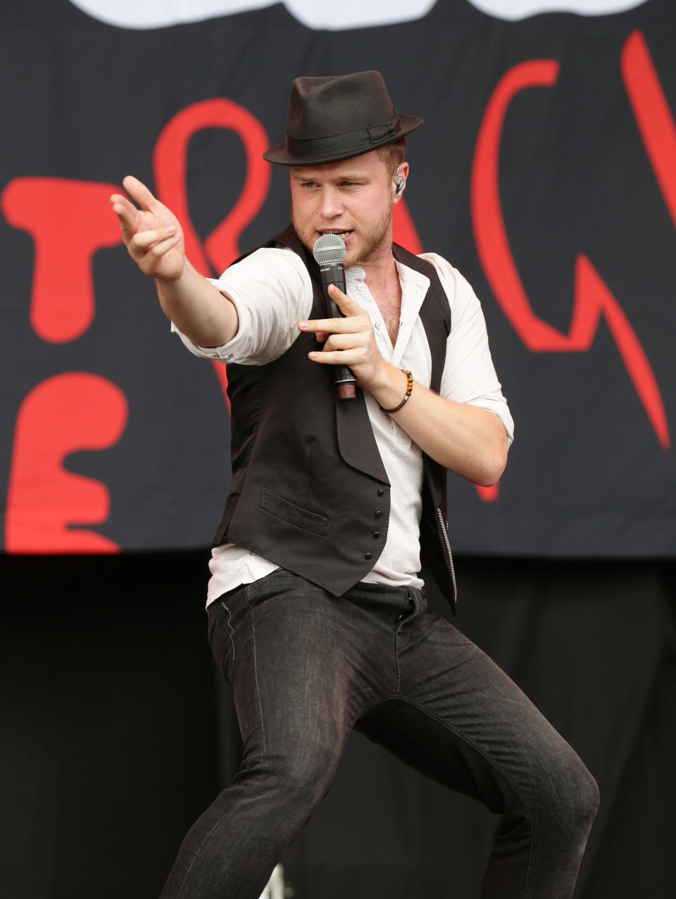 Olly Murs performing on the Virgin Media Stage during day two of the V Festival at Hylands Park in Chelmsford.