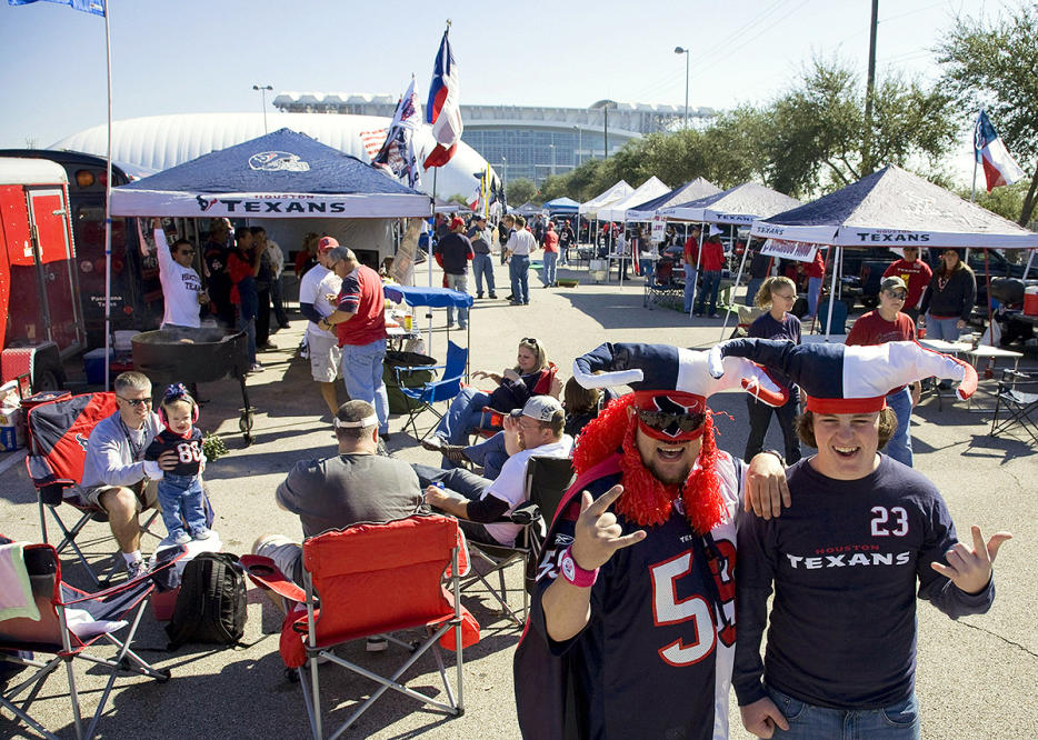 Fans tailgate prior to an NFL football game between the Houston