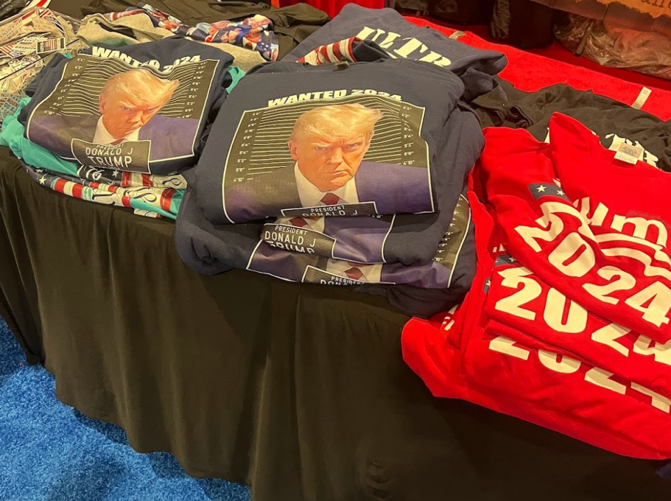T-shirts with Donald Trump’s Georgia mug shot sold at CPAC (Gustaf Kilander / The Independent)