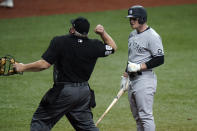 New York Yankees' Clint Frazier, right, gets thrown out of the game by home plate umpire Bill Miller after Frazier struck out against Tampa Bay Rays pitcher Ryan Yarbrough during the fifth inning of a baseball game Wednesday, May 12, 2021, in St. Petersburg, Fla. (AP Photo/Chris O'Meara)
