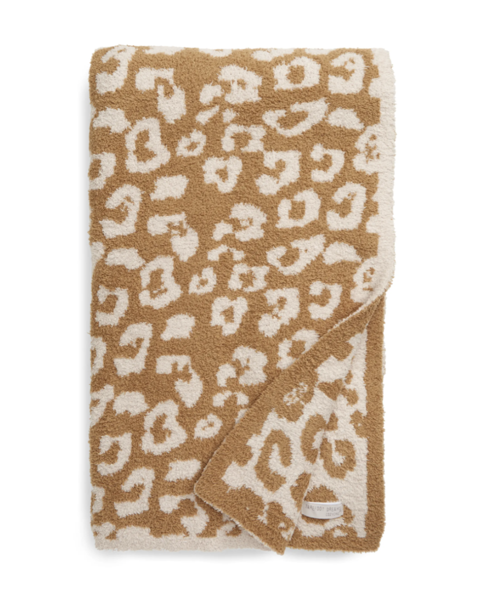 Barefoot Dreams In the Wild Throw Blanket in Camel/Stone (Photo via Nordstrom)