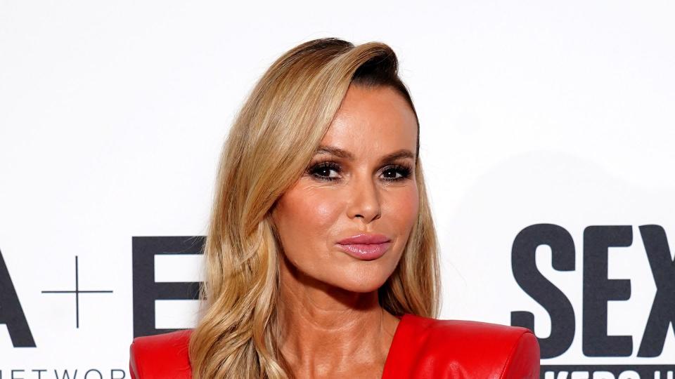 amanda holden posing in red leather dress 