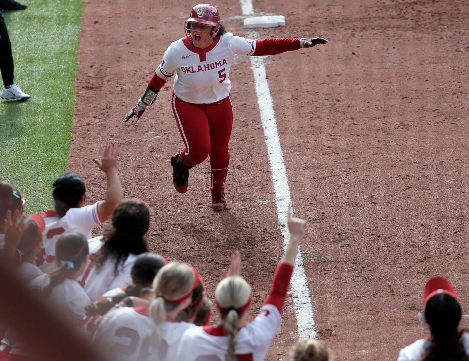 OU freshman Ella Parker celebrates a home run in the sixth inning of an 8-2 win against OSU in Bedlam on Sunday at Love's Field in Norman.