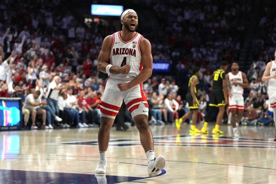 Arizona guard Kylan Boswell (4) reacts after Oregon calls a time out during the first half of an NCAA college basketball game, Saturday, March 2, 2024, in Tucson, Ariz. (AP Photo/Rick Scuteri)