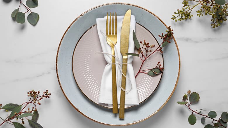 Place setting with napkin