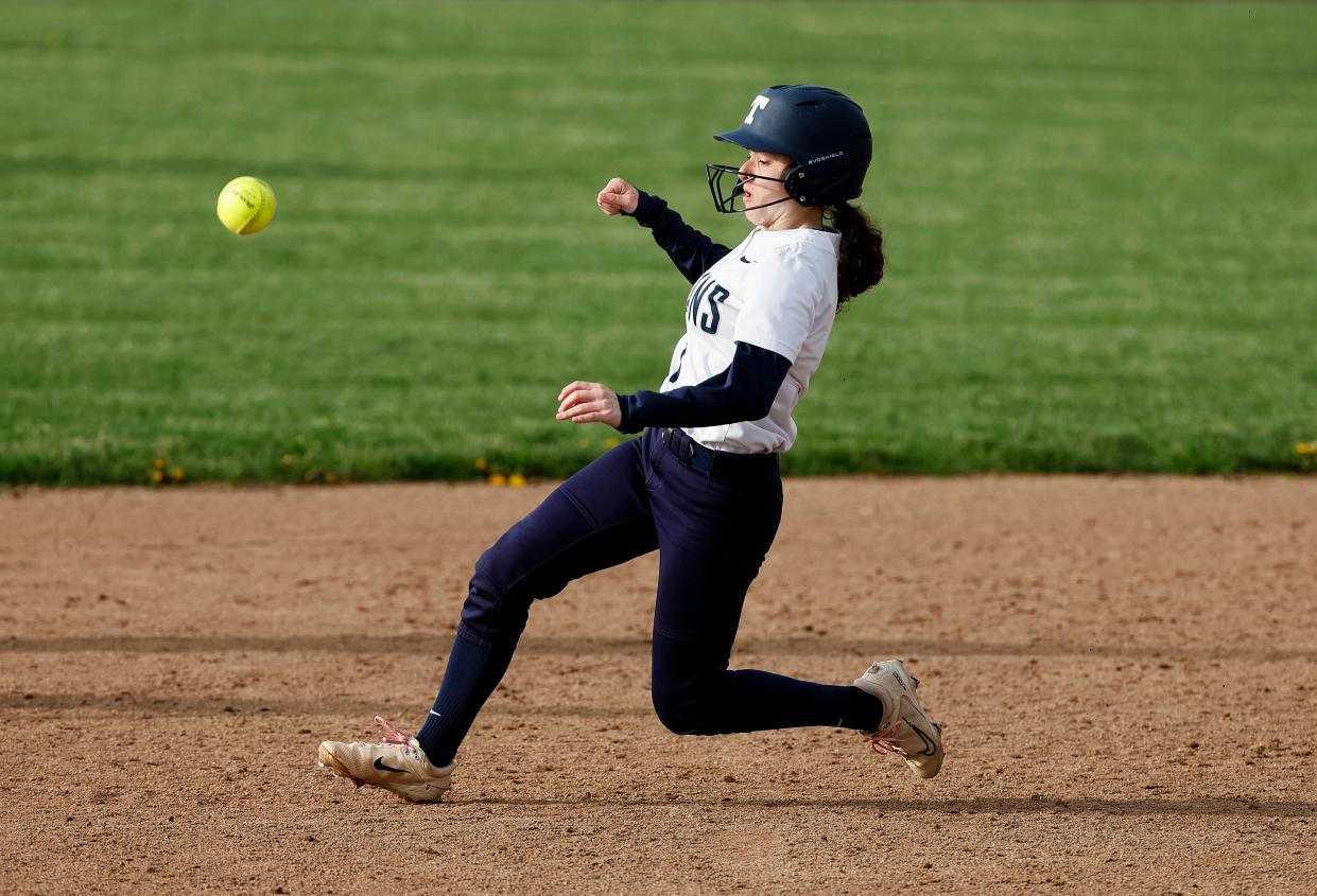 Thomas’s Ella Maloney is safe stealing second base against Hilton.