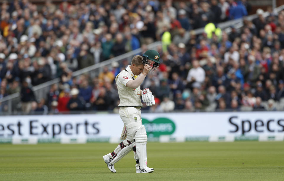 Australia's David Warner leaves the field after being dismissed during day one of the fourth Ashes Test cricket match between England and Australia at Old Trafford in Manchester, England, Wednesday, Sept. 4, 2019. (AP Photo/Rui Vieira)