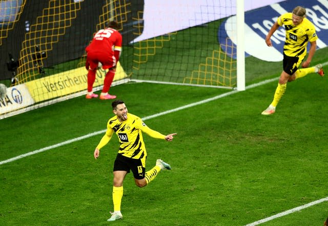 Raphael Guerreiro celebrates scoring for Dortmund 