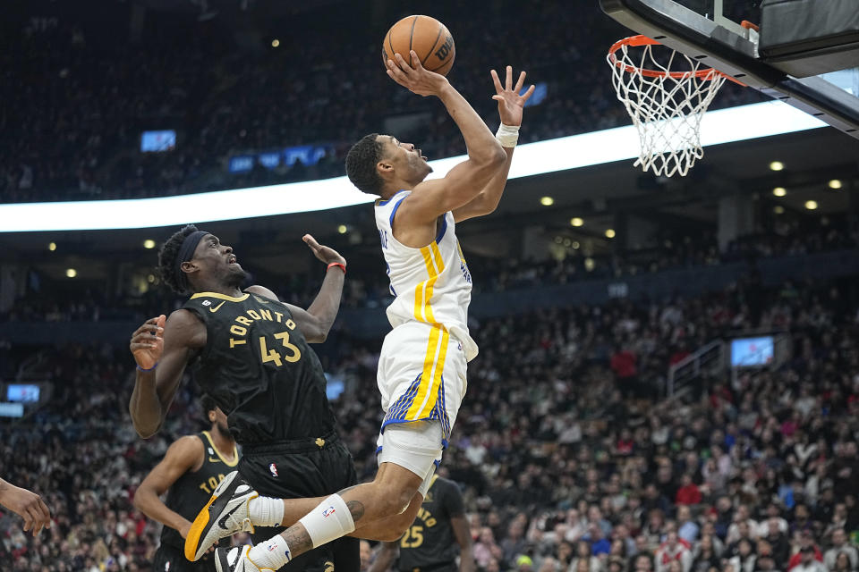 Dec 18, 2022; Toronto, Ontario, CAN; Golden State Warriors guard Jordan Poole (3) goes up to make a basket against Toronto Raptors forward <a class="link " href="https://sports.yahoo.com/nba/players/5658" data-i13n="sec:content-canvas;subsec:anchor_text;elm:context_link" data-ylk="slk:Pascal Siakam;sec:content-canvas;subsec:anchor_text;elm:context_link;itc:0">Pascal Siakam</a> (43) during the first half at Scotiabank Arena. Mandatory Credit: John E. Sokolowski-USA TODAY Sports